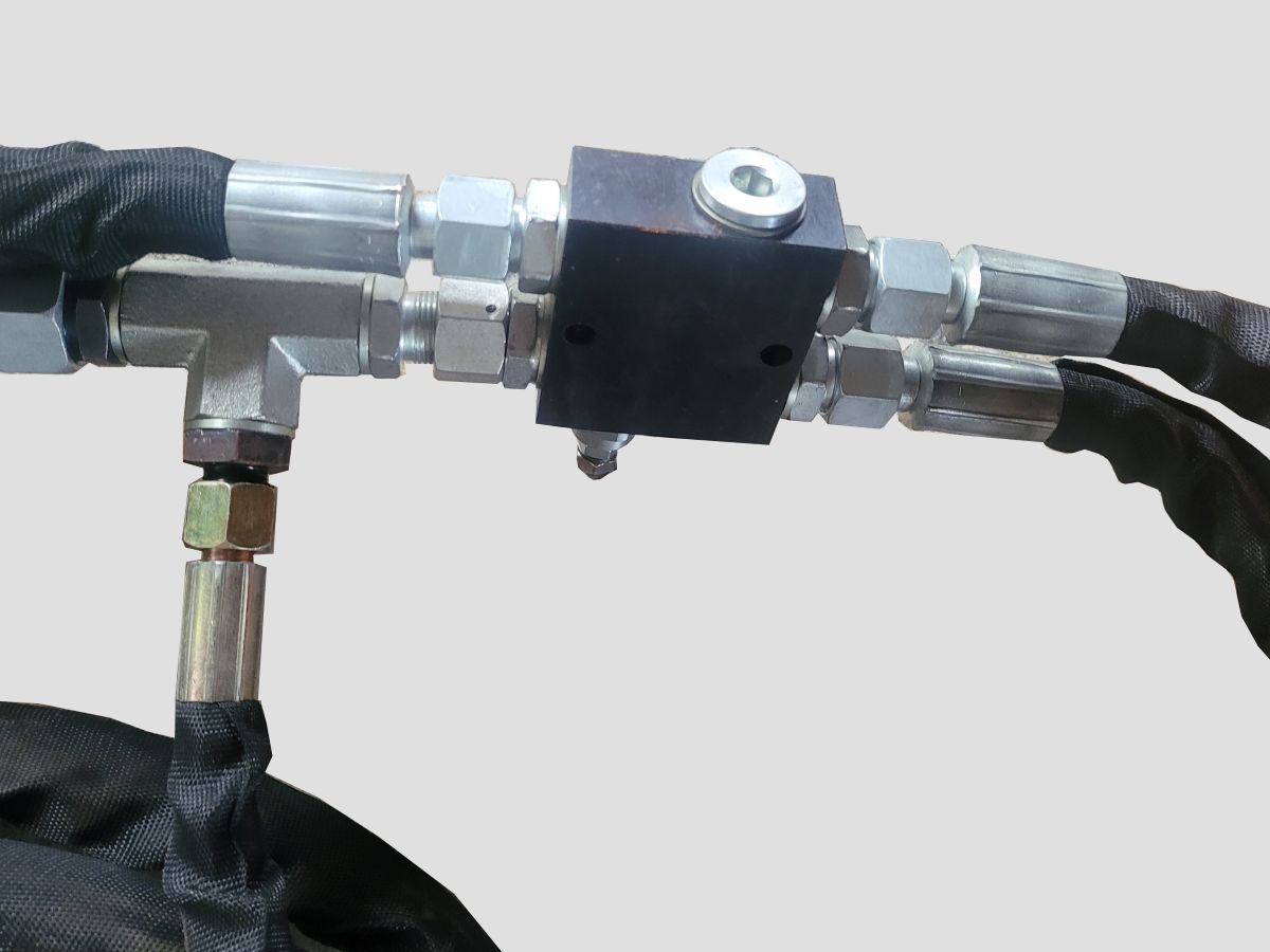 Hydraulický přepouštěcí ventil mulčovacího disku